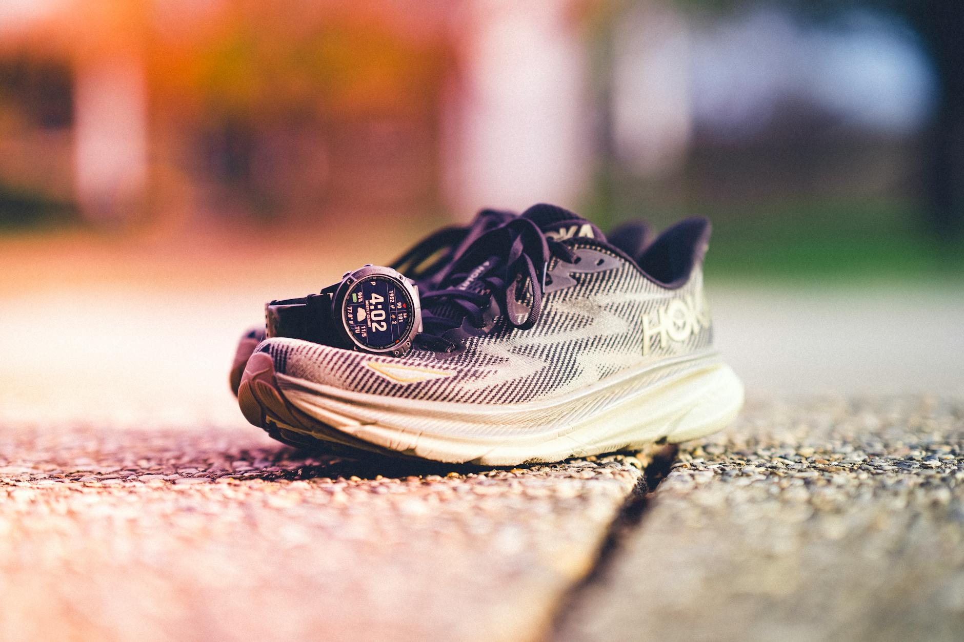 On and Hoka trainers side by side comparison highlighting design and cushioning differences